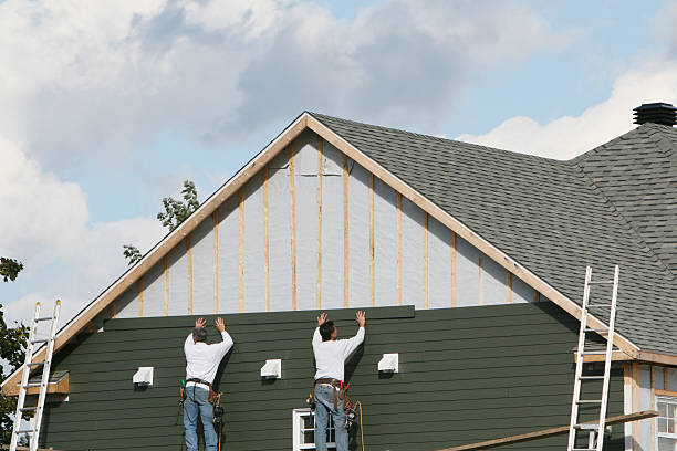Professional Storm Damage Siding Repair technician working in Orange City, FL